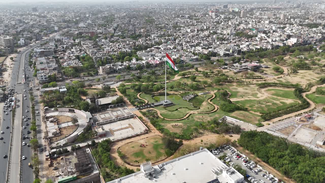 Drone passing very close to Indian flag placed in the middle of the city Jaipur