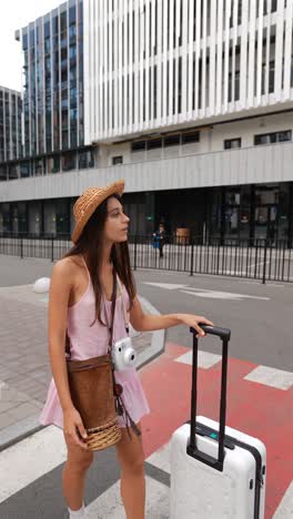 two women traveling in city