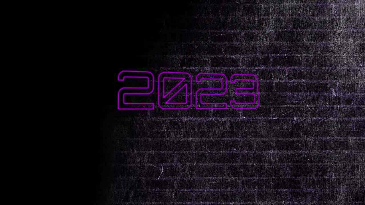 Animazione di testo neon 2023 su parete di mattoni neri