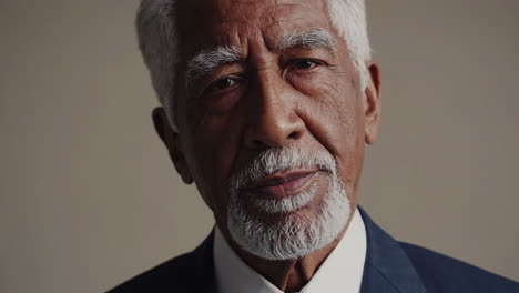 close-up portrait of a senior man with a grey beard