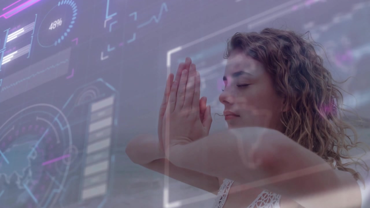 Woman raising forearms triggers biofeedback chart shifting as lowering into prayer pose for health