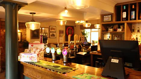 a well-stocked bar counter in oxford, england