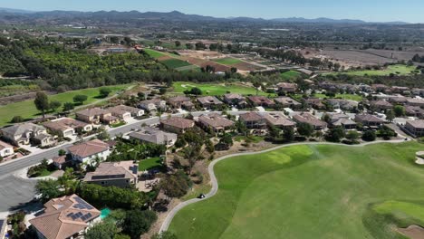 drone shot of homes on the golf course