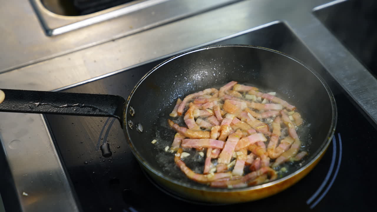Chef with pan in restaurant. Chefs preparing food in the kitchen of restaurant