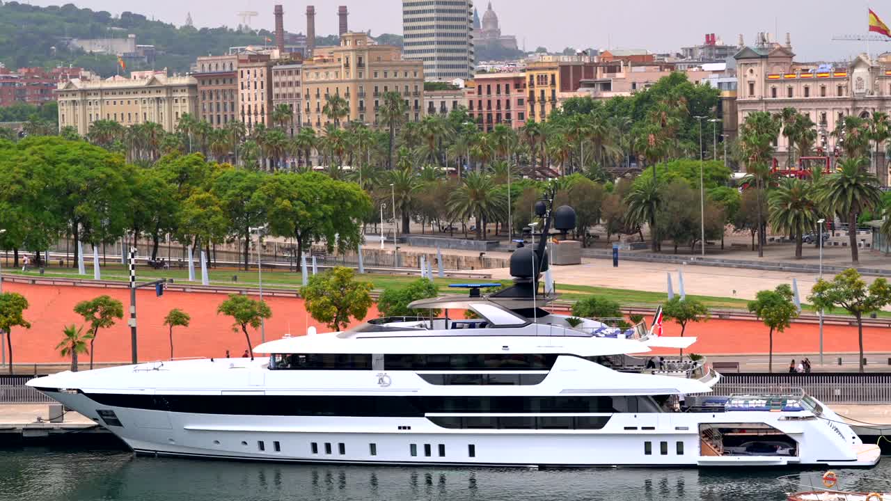 Aerial drone view of boats docked in the Port Vell in Barcelona, Spain