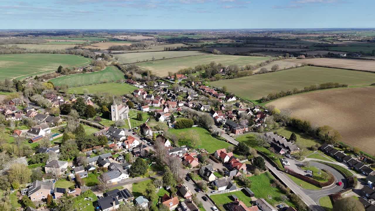 Rattlesden Village Suffolk UK pull back drone aerial reverse reveal