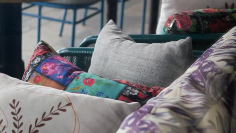 colorful pillows on outdoor patio furniture