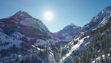 drone shot of a bright and sunny day in the mountains of colorado