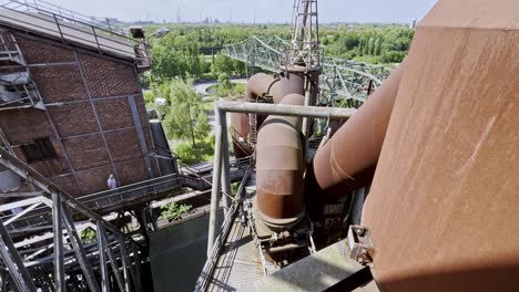 large rusty vent pipes from above for a steel blast furnace in the landschaftspark in dusísbug germany