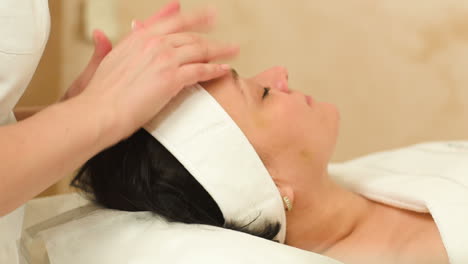 professional facial massage at beauty spa