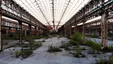 aerial shot in an abandoned factory zoom out 4k