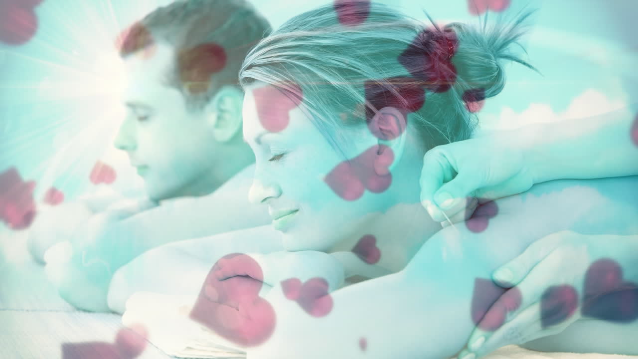 마사지를 받는 부부, 심장 모양의 애니메이션이 떠다니며 휴식을 취하는 부부