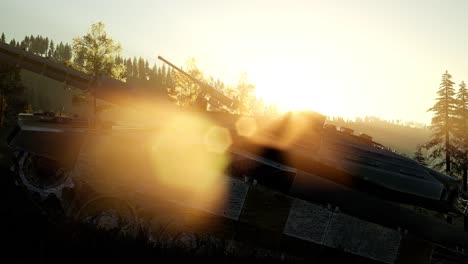 old rusty tank in the forest at sunset