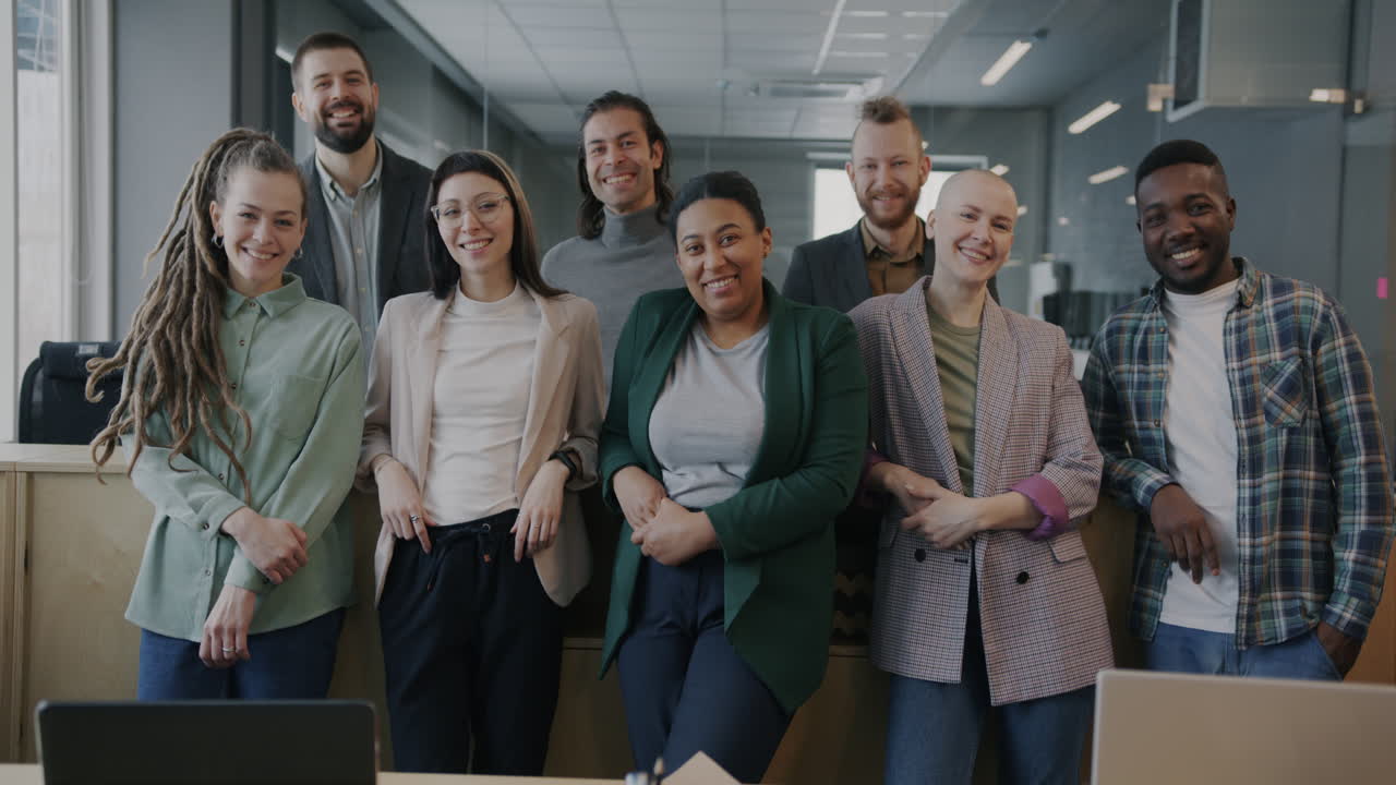 Happy diverse team in modern office