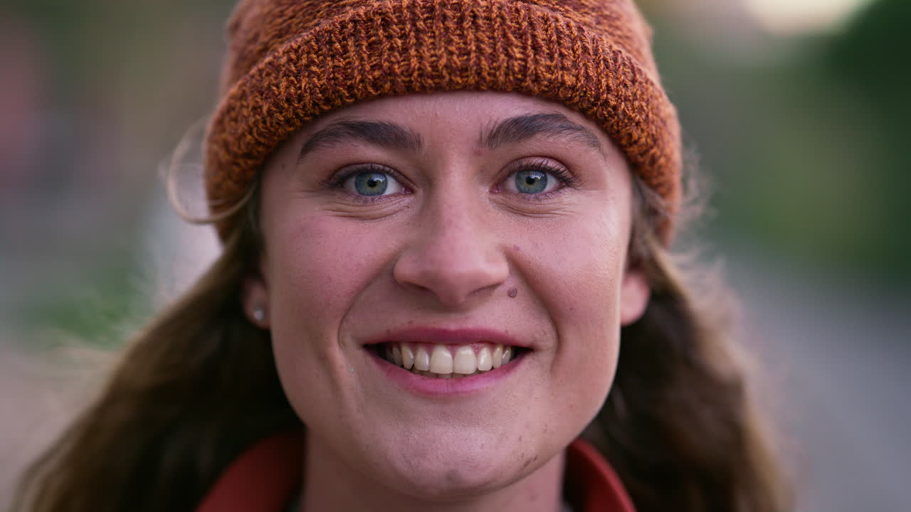 Portrait of a Smiling Woman in a Beanie