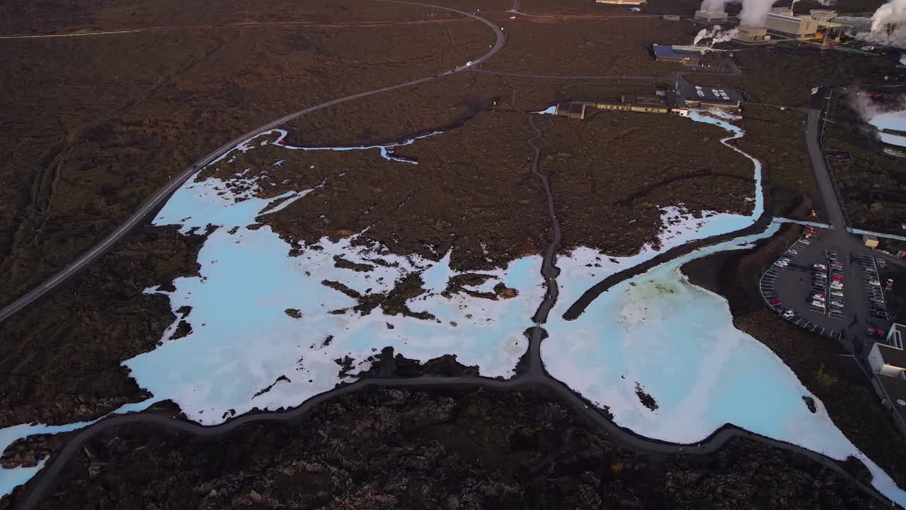 Empty blue lagoon Icelandic geothermal spa at sunrise