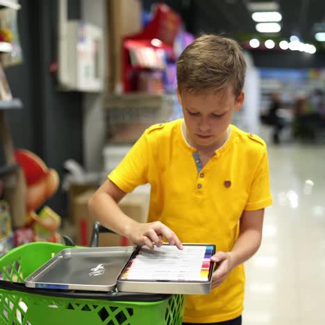 boy in school store