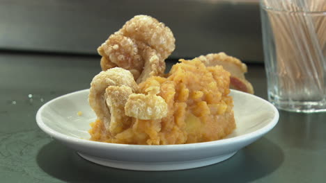 crispy pork skin with mashed potatoes