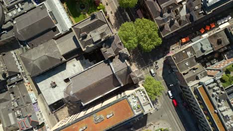 descending overhead aerial video of st ann's church in dublin city centre, ireland on a bright and sunny day. filmed in 4k, 60fps and with rec709 color.