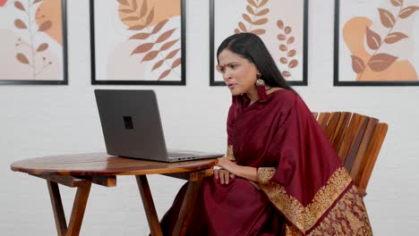 indian female employ on video call meeting