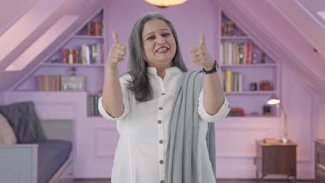 Happy-Indian-mother-showing-thumbs-up