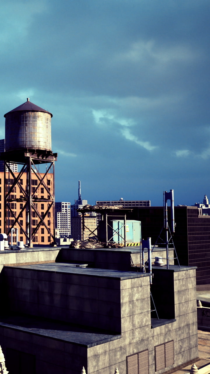 Water tower stands tall against a stormy skyline in the quiet dusk hours