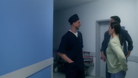 doctor discussing with patient family