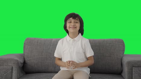 Happy-Indian-boy-doing-Namaste-Green-screen