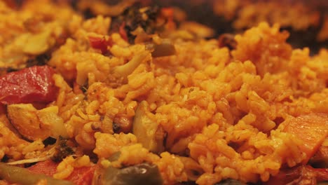 seafood rice, close up of a traditional tasty spanish dish paella served with prawns and mussels
