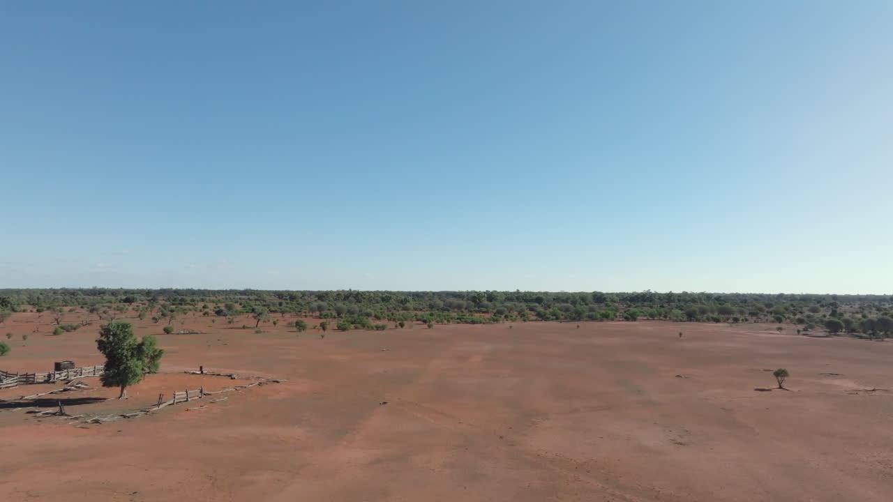 Aerial: Drone flying low over the Australian outback near Bourke, NSW Australia