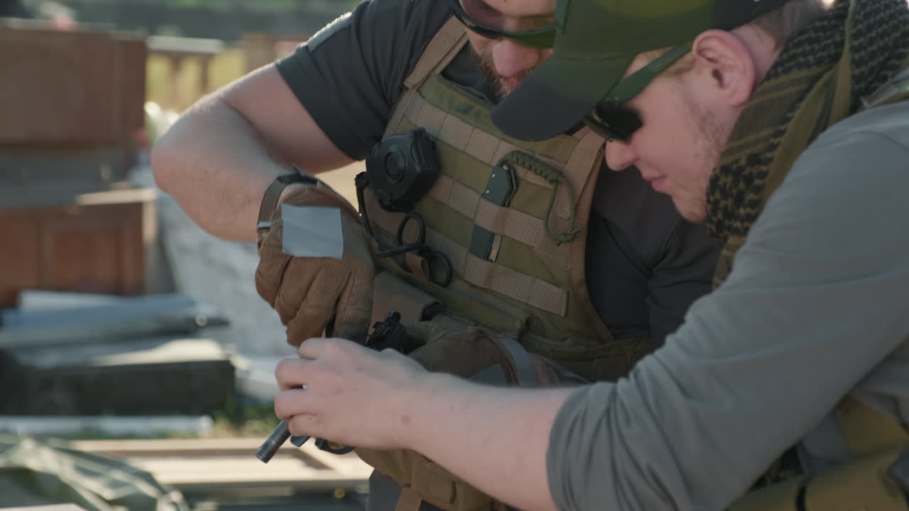 Sergeants Assembling Guns In Army