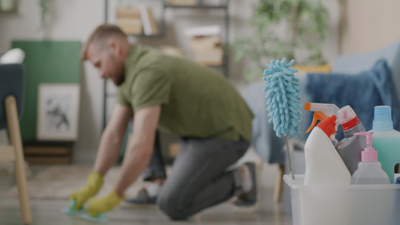 Man Cleaning the Floor