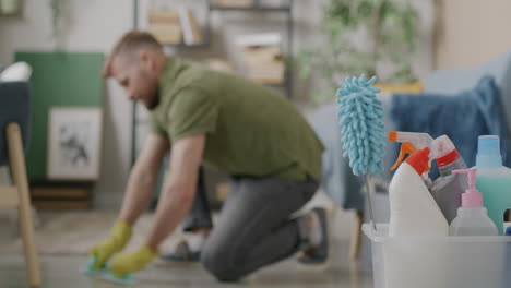 man cleaning the floor