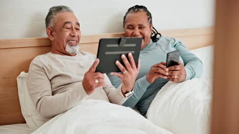 Phone,-tablet-and-mature-couple-in-bed