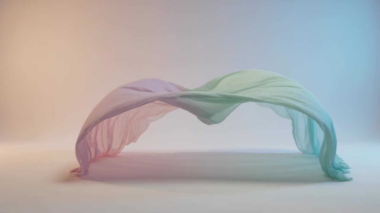 Air burst lifting translucent pastel fabric rising and arching on studio floor to reveal folds