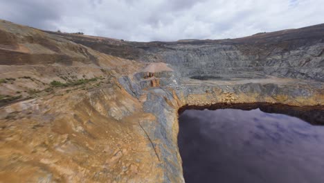 contentious open pit mining operation of barrick pueblo viejo. fpv drone view