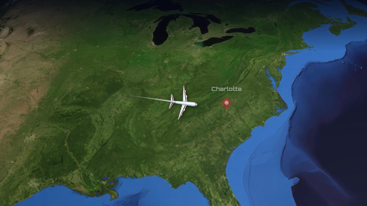 Satellite map animation tracks a commercial airplane flying from Las Vegas to Charlotte, North Carolina