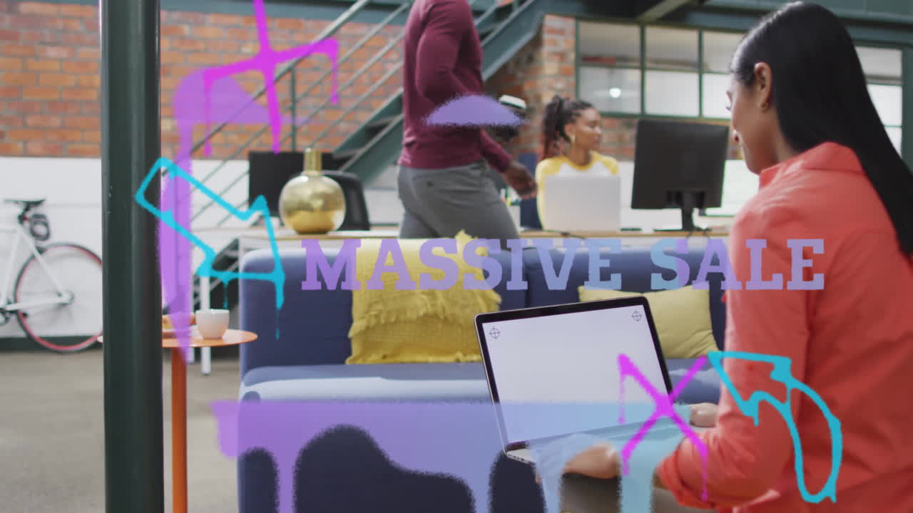 Massive sale text animation over diverse coworkers collaborating in modern office