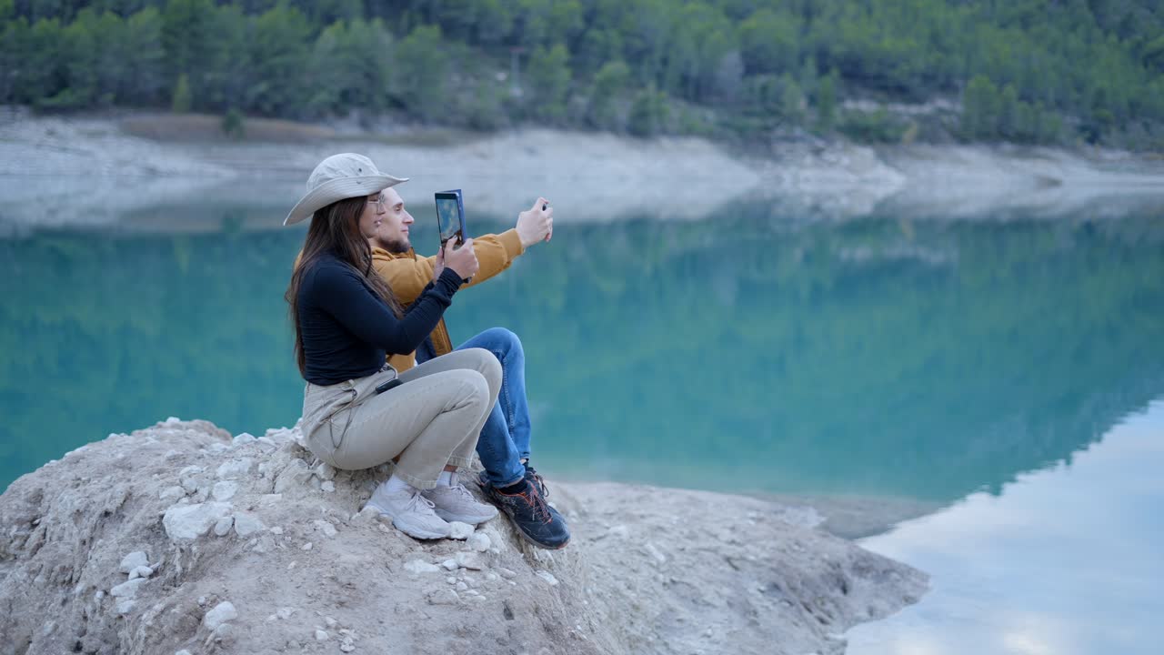 Couple Taking a Selfie by the Lake