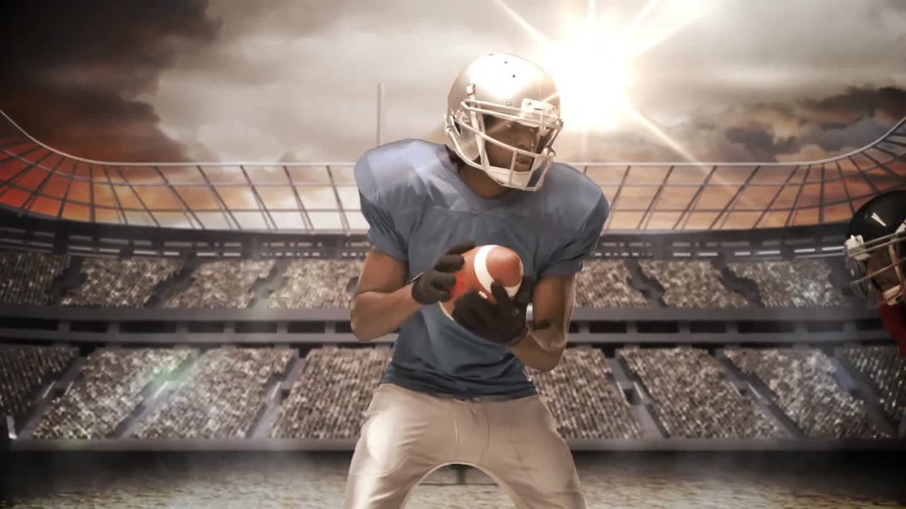 Giocatore di football americano serio che placa per il pallone
