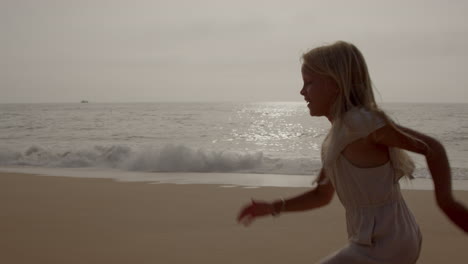 happy child running on the beach