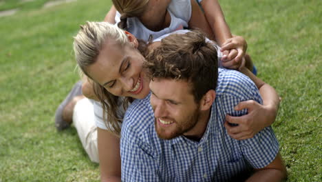 Family-of-four-playing-in-the-garden