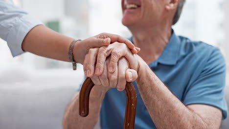 Senior-smile,-cane-and-holding-hands-of-nurse