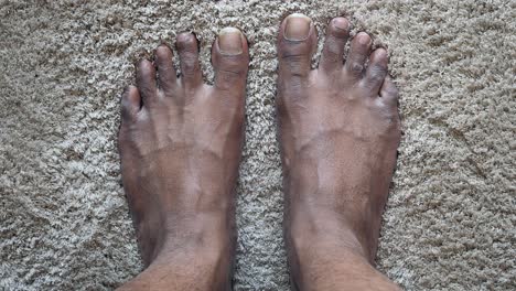 bare feet on carpet