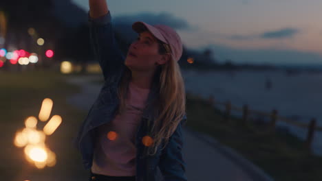 sparkler-girl-playing-with-sparklers-celebrating-new-years-eve-dancing-with-friend-having-fun-evening-sharing-4th-of-july-celebration-at-night