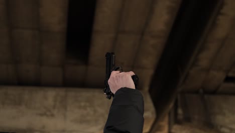 slow-motion footage of an alarm pistol being fired into the air under a viaduct