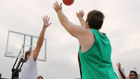 basketball player throwing basketball in hoop 4k