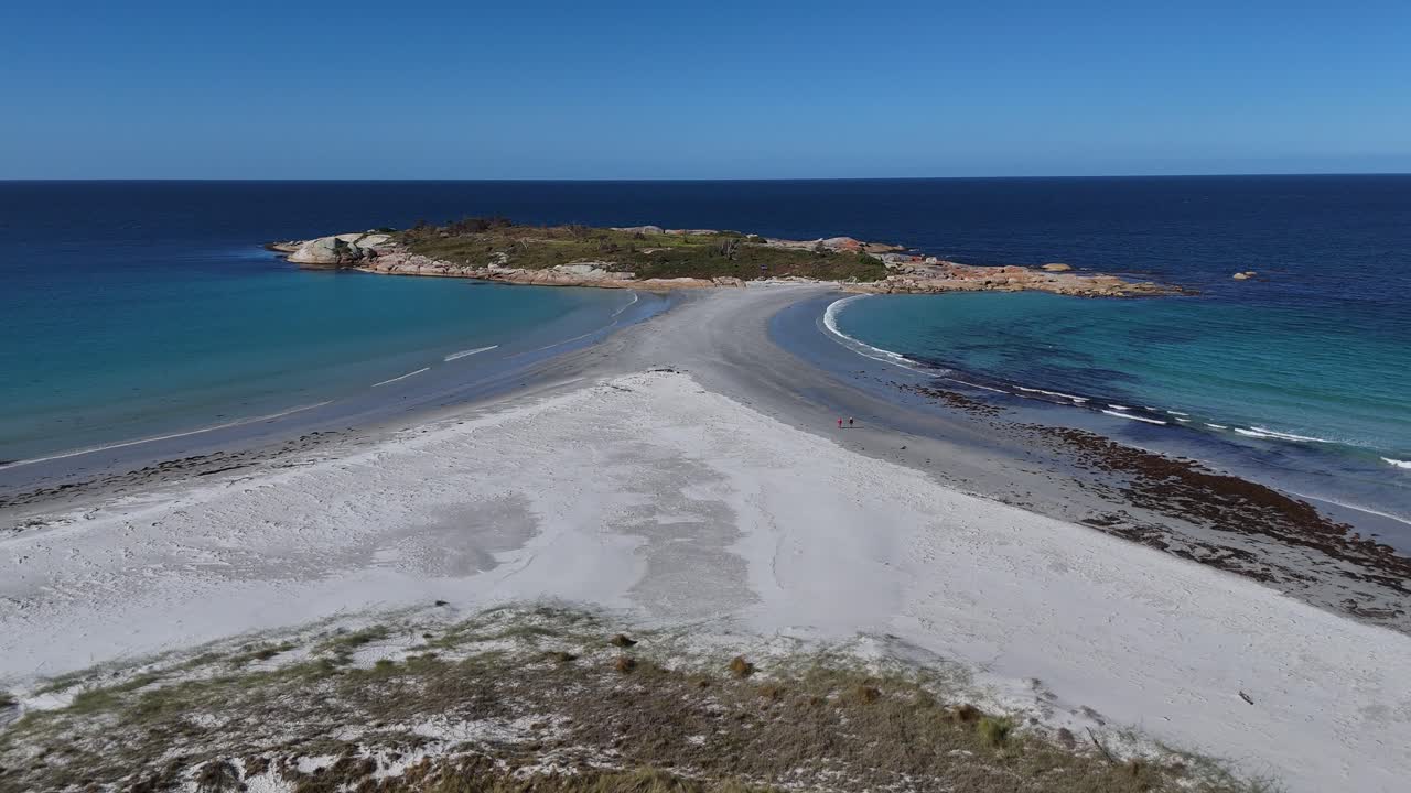 Descending towards Diamond Island with sandbar towards beach, aerial shot