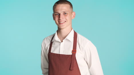 happy waiter smiling and posing