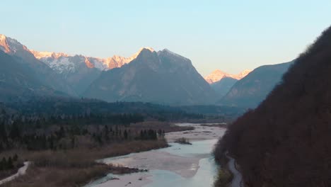 descending over river in valley